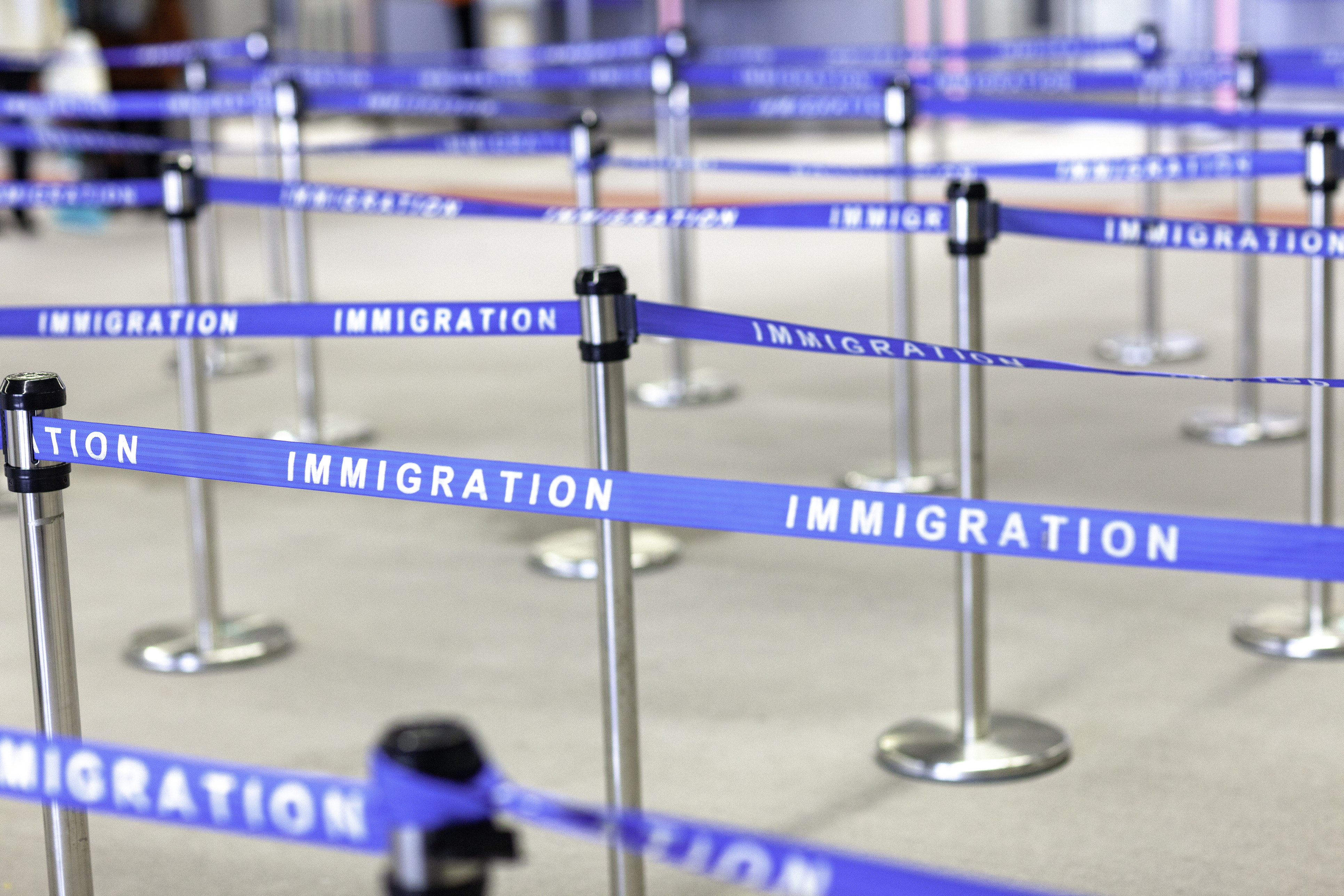 An image of an immigration boarding line.