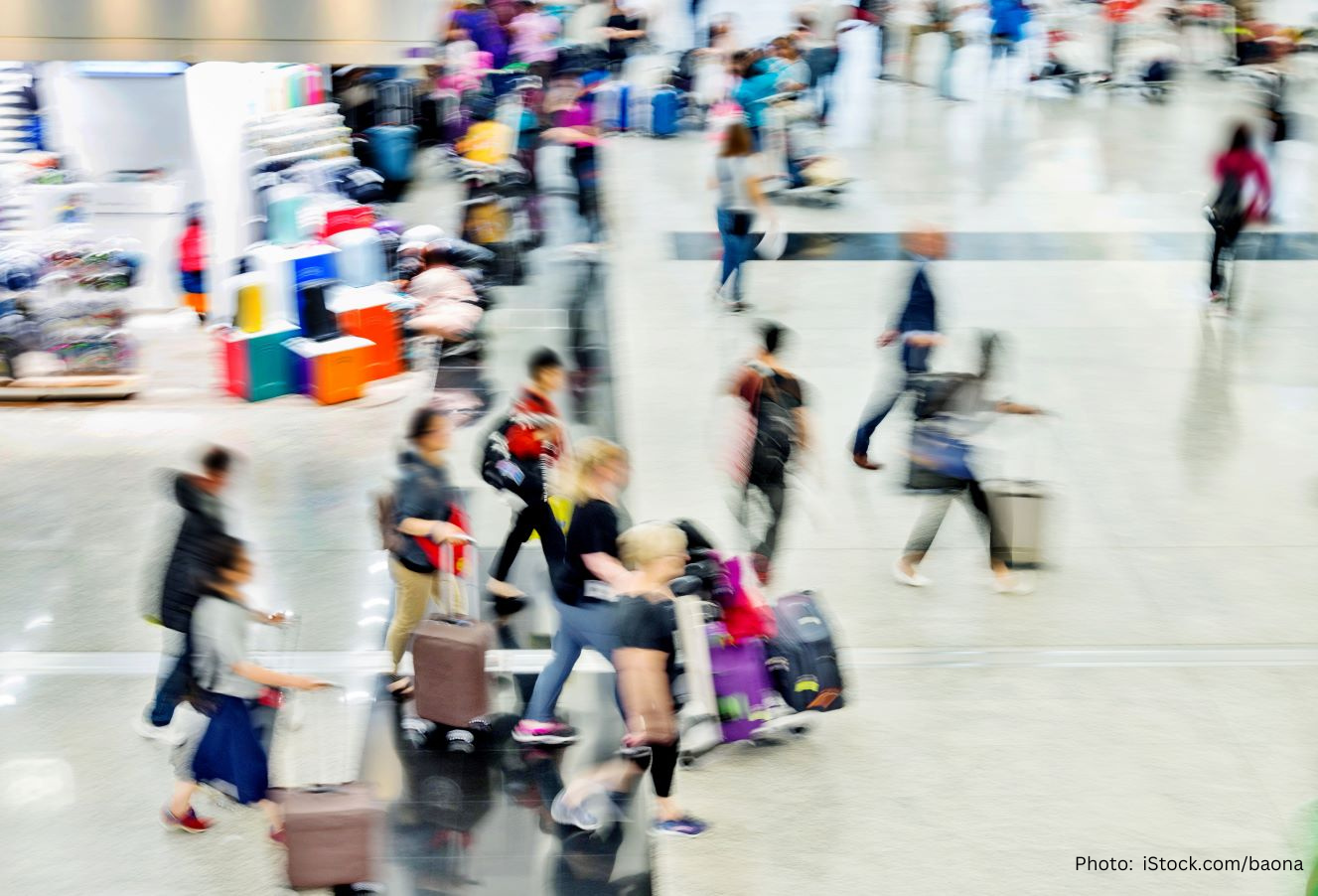 People walking in an airport.