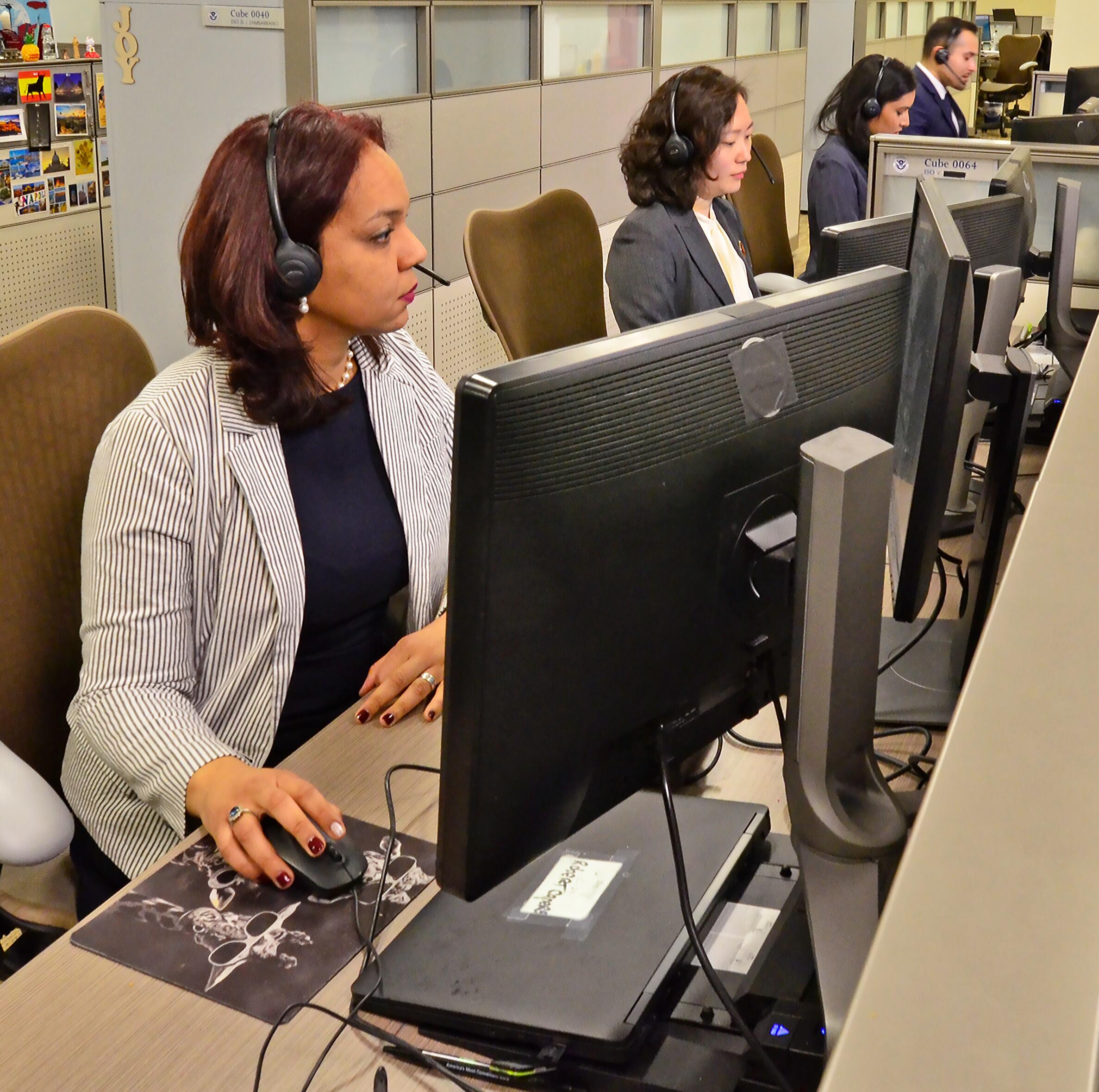 Image of USCIS employees at work