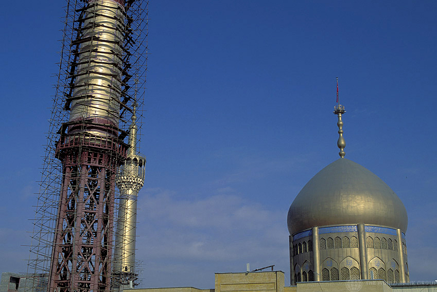 Scaffolding surrounds a mosque in Iran.