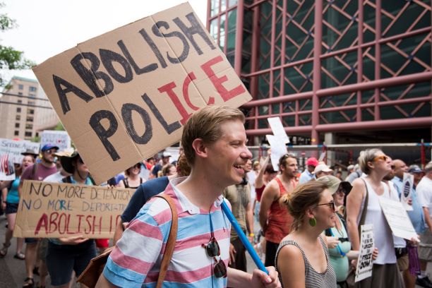 Protesters at a rally in Minneapolis call for abolishing ICE