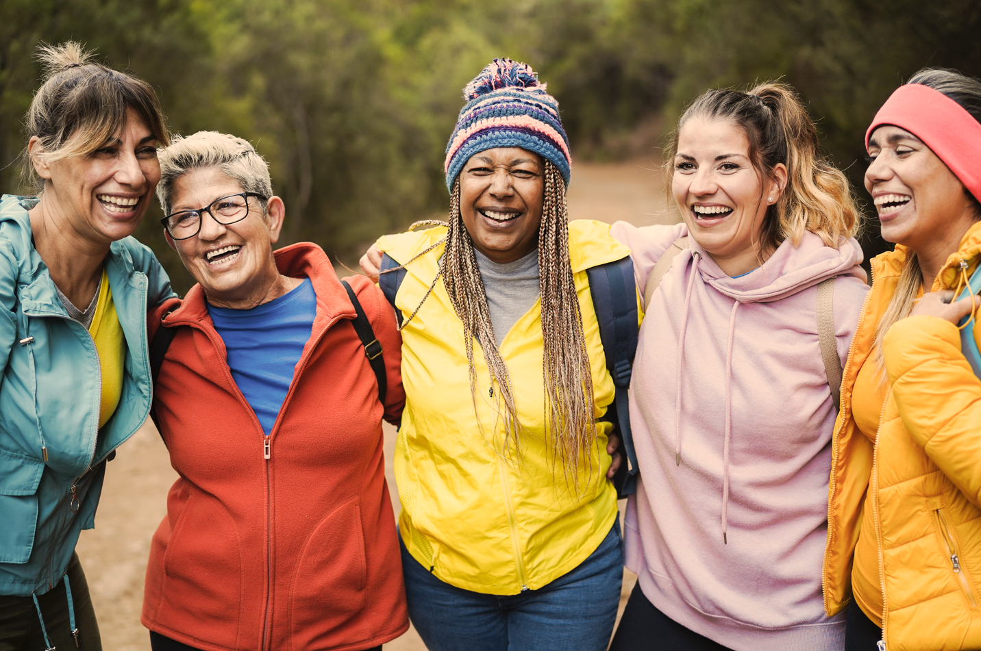 Image of women smiling on hike