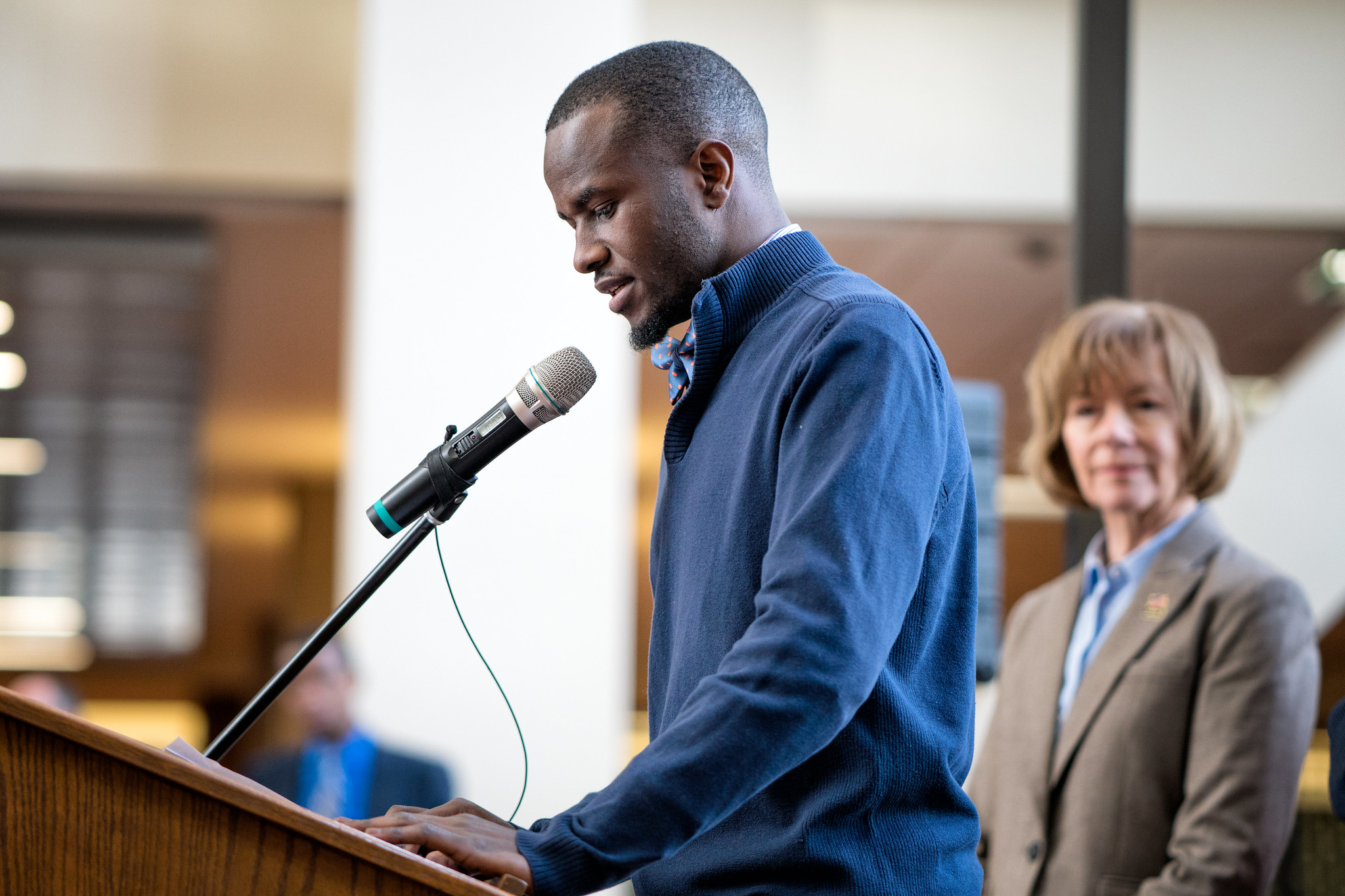 Image of aspiring pastor and DACA recipient speaking at DACA event in Minneapolis