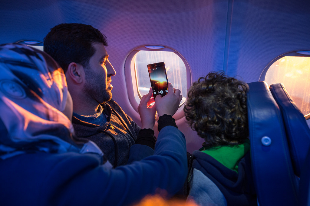 Syrian family on a plane