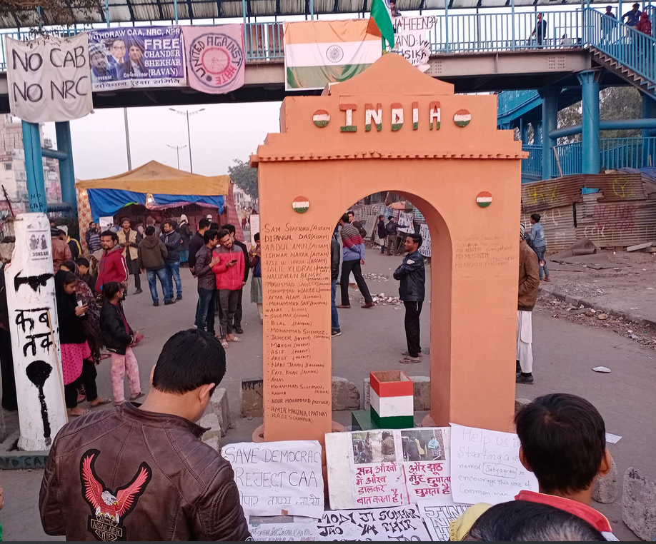 Photo of India gate in Delhi, India featuring names of protestors killed in anti-Citizenship Act demonstrations