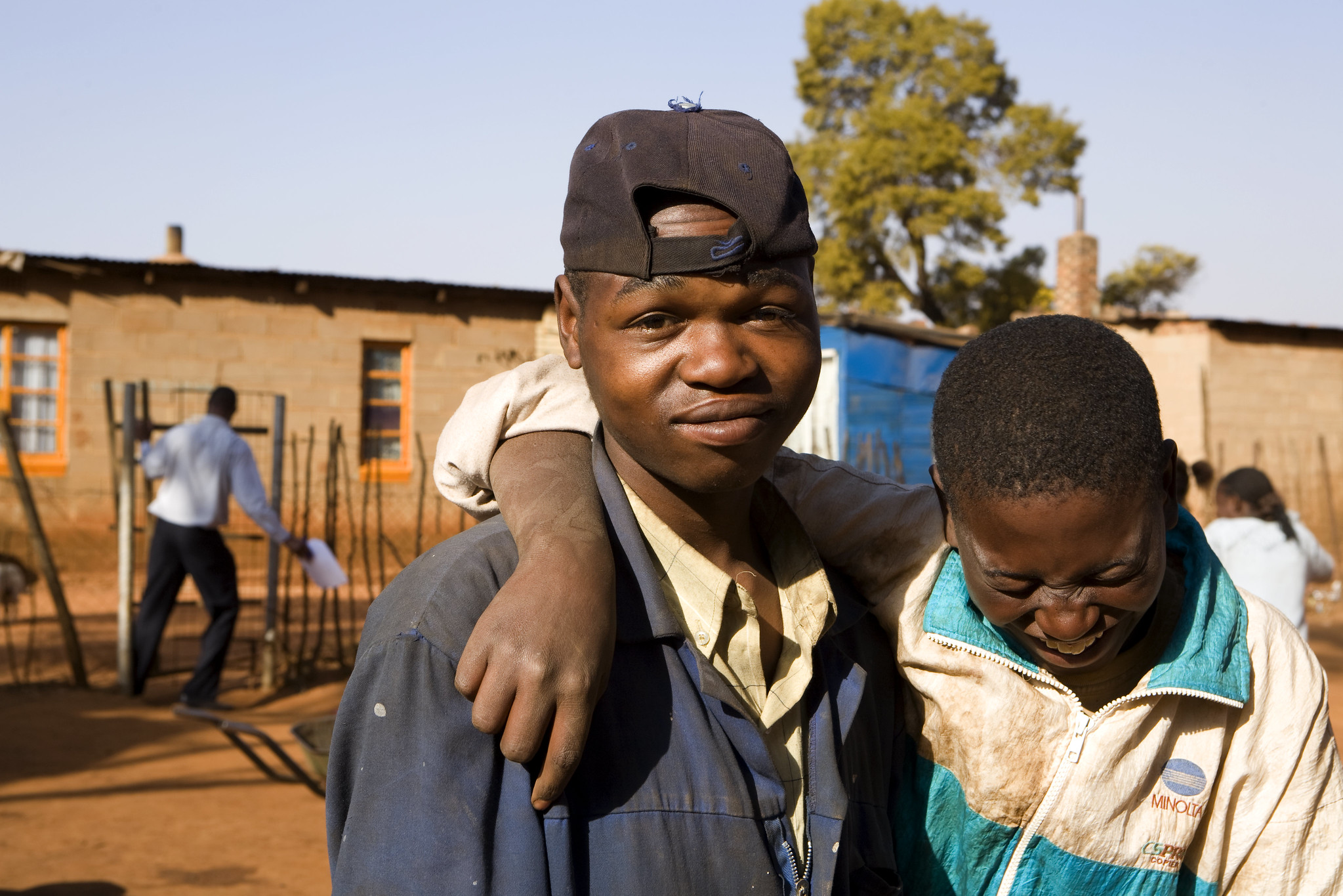 Two boys pose in an informal settlement east of Johannesburg largely populated by immigrants.