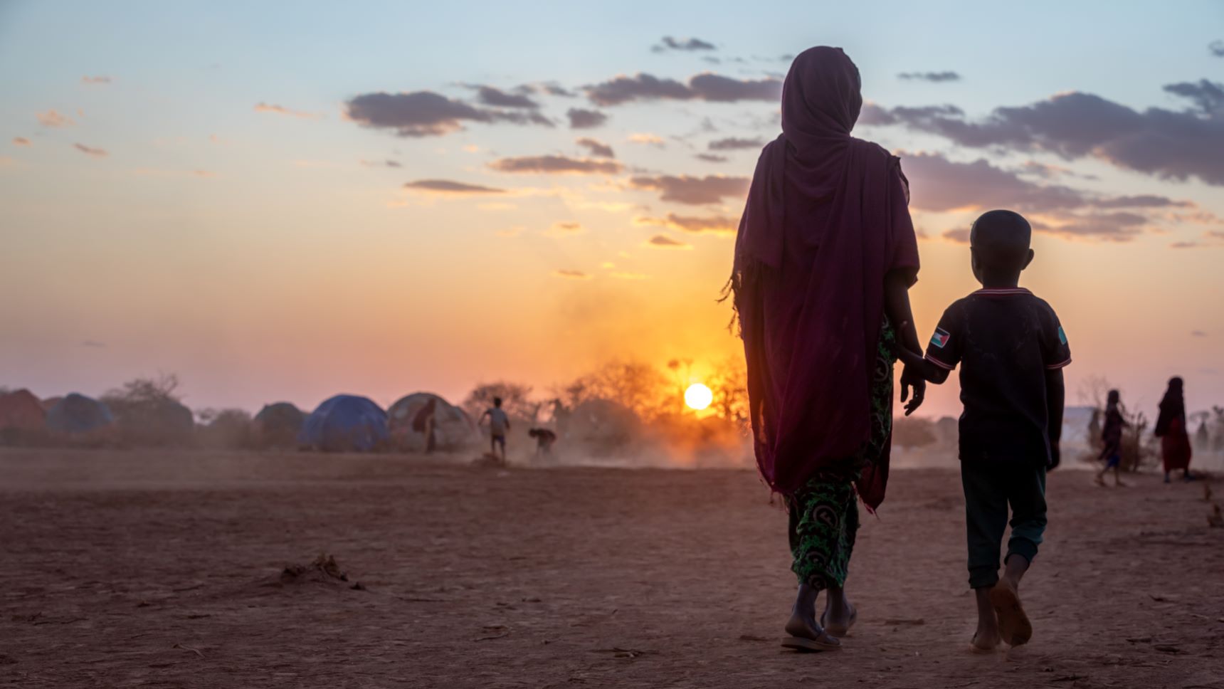 A woman and child walk in the Somali region of Ethiopia.