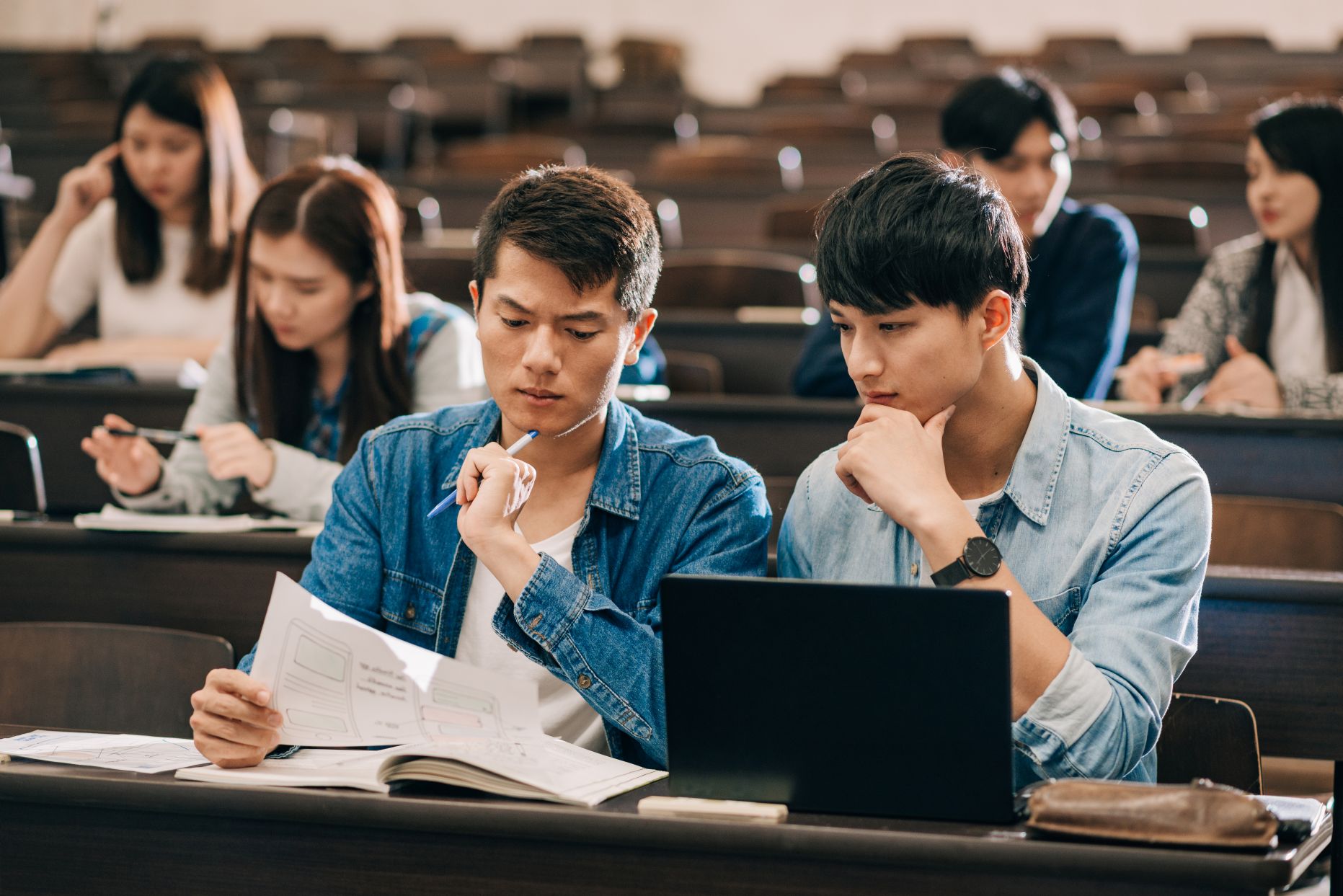 Students in a lecture hall.
