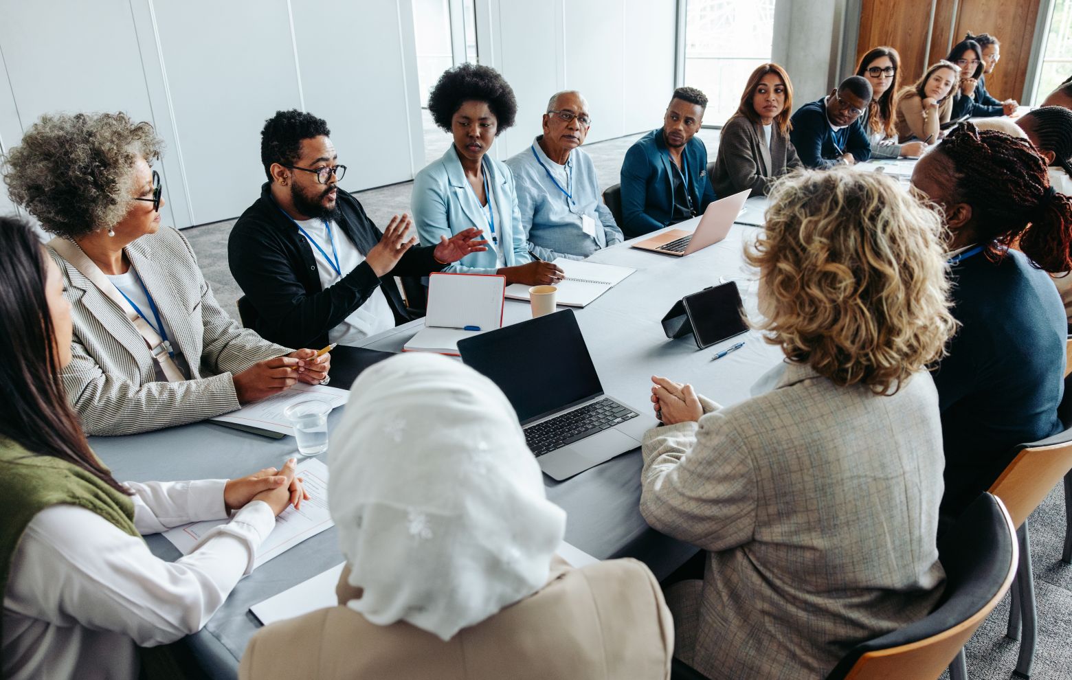 A group of people in a meeting.