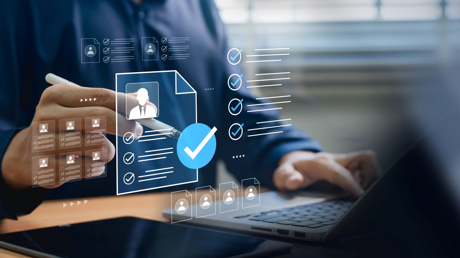 A person uses a digital tool to screen a job applicant