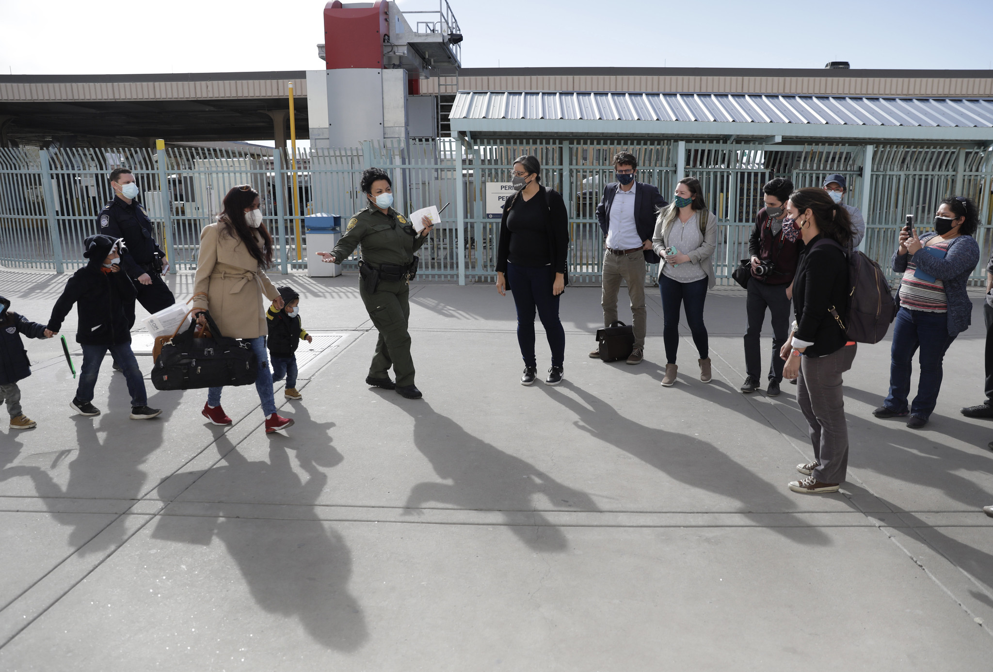 Migrants enrolled in the Migrant Protection Protocols are processed by U.S. Customs and Border Protection officers.