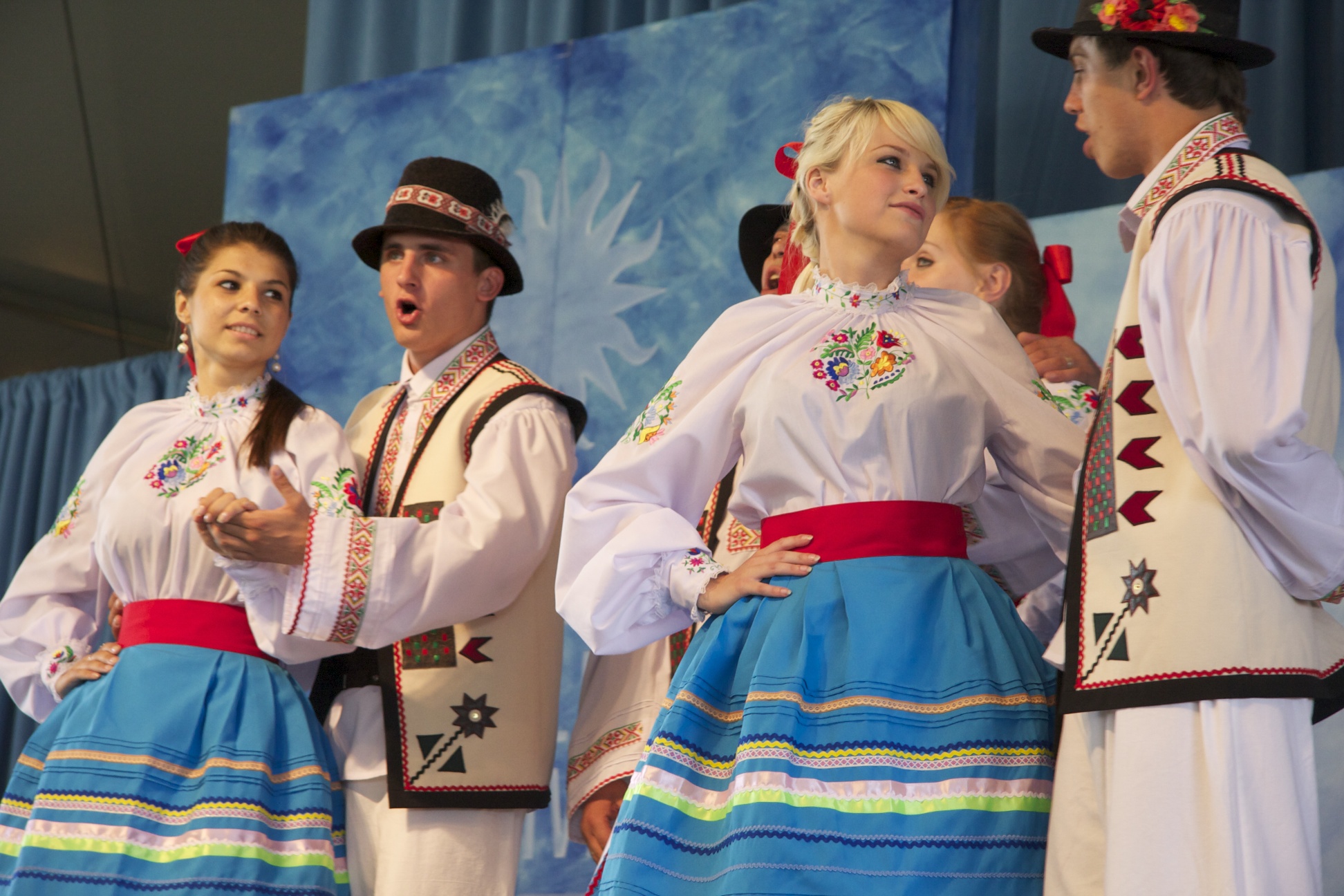 Four dancers in traditional Ukrainian dress.