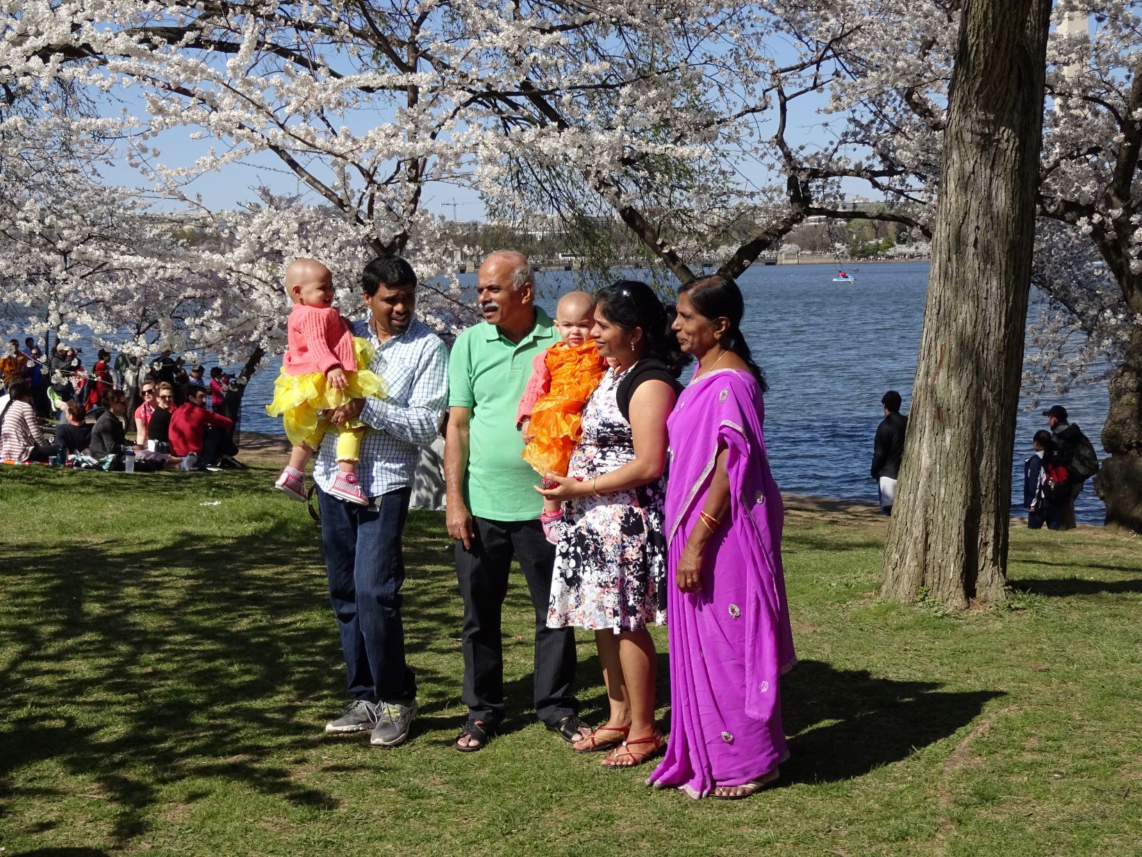 A family takes a photo in Washington, DC.