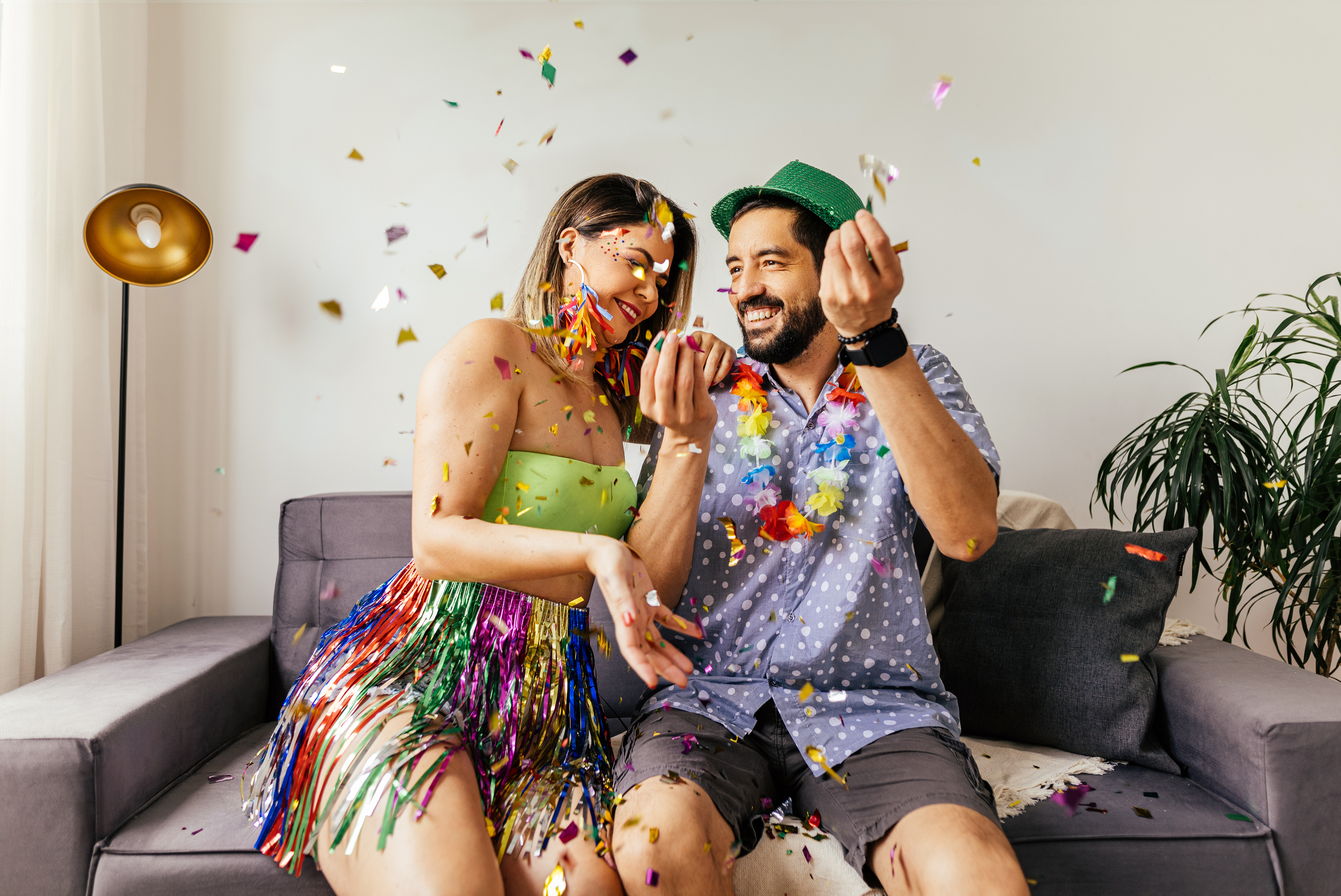 A couple celebrating carnival at home.