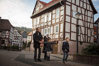 A family from Syria walks through the town of Wächtersbach, Germany, where they now live.